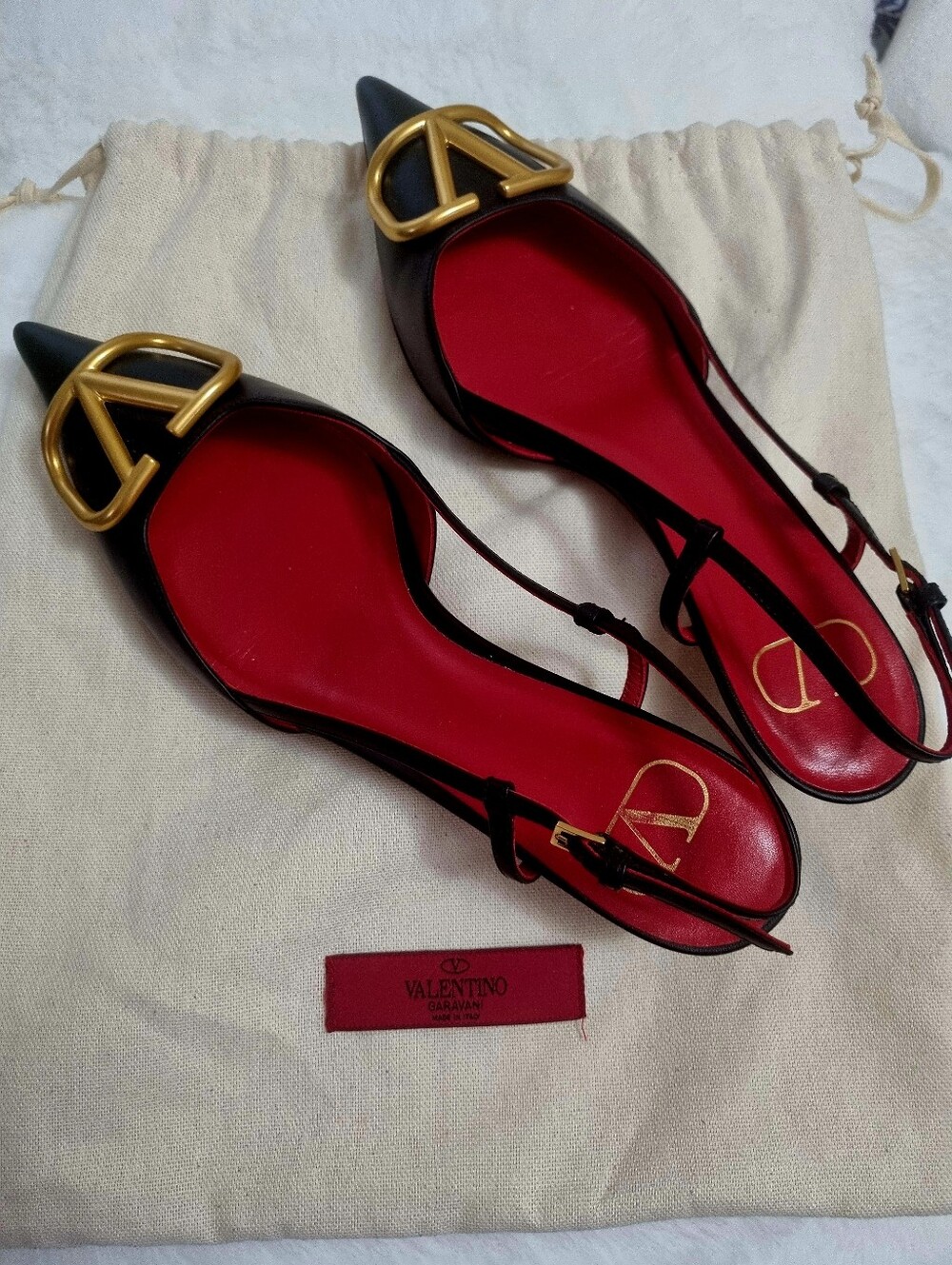 Valentino Garavani Black Leather Pointed Slingback Flats with Gold Logo